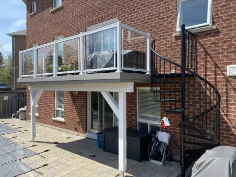 High clubhouse deck with glass railing