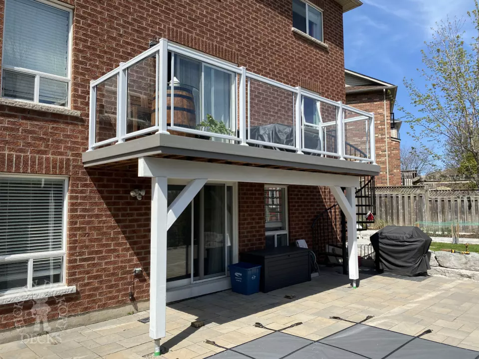 High clubhouse deck with glass railing