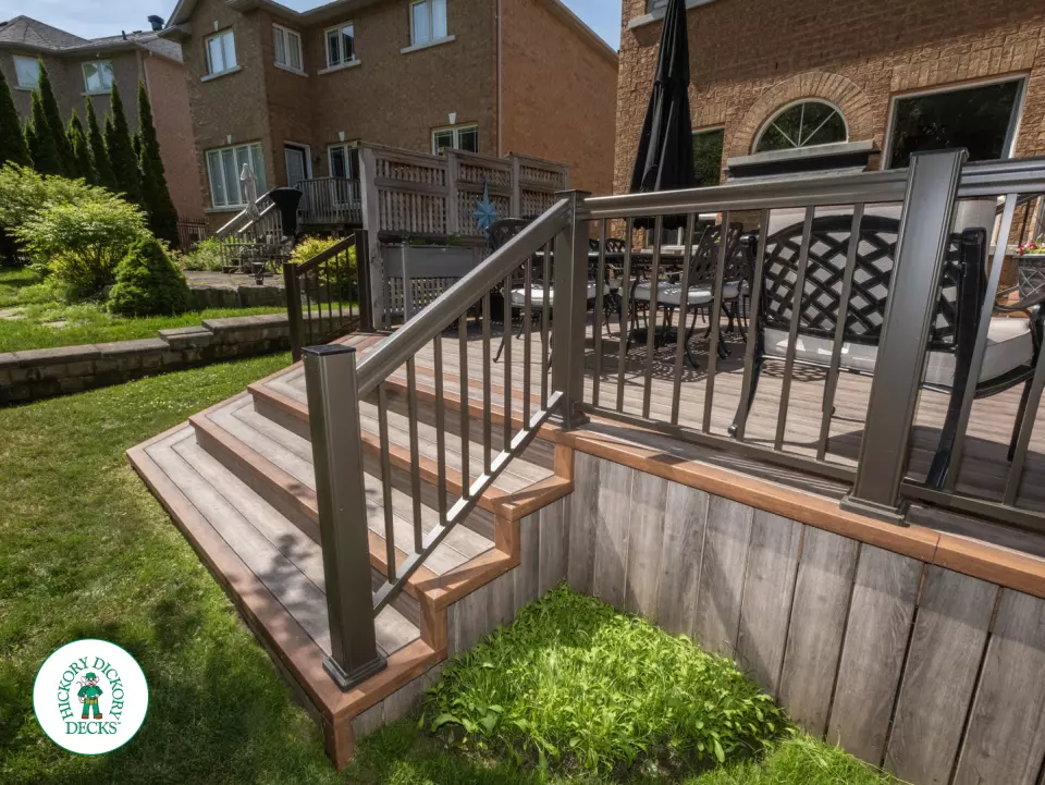 Zuri deck with floor pattern, built in ights and privacy screens in Richmond Hill
