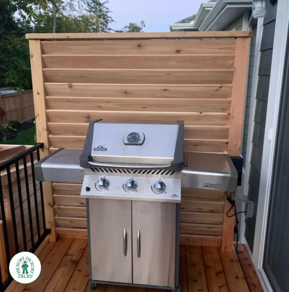Small Poolside Cedar Deck with Stairs with Lights in Ottawa