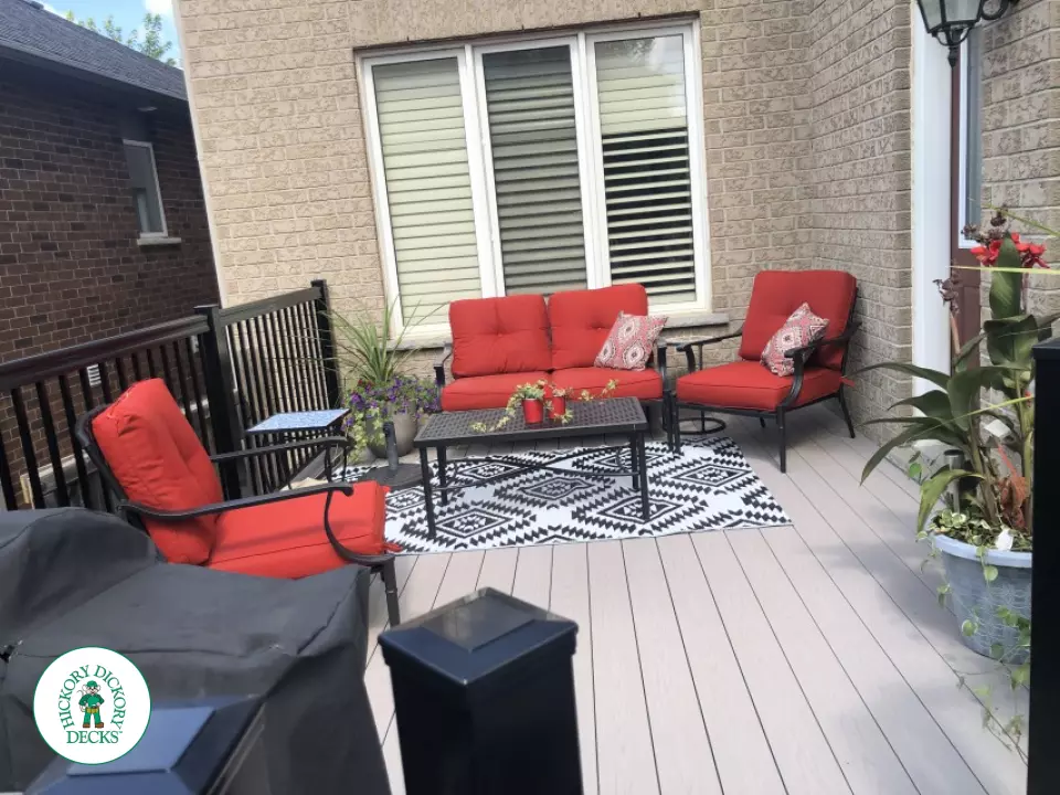 Azek deck with aluminum railing and lights in stairs in Innisfil