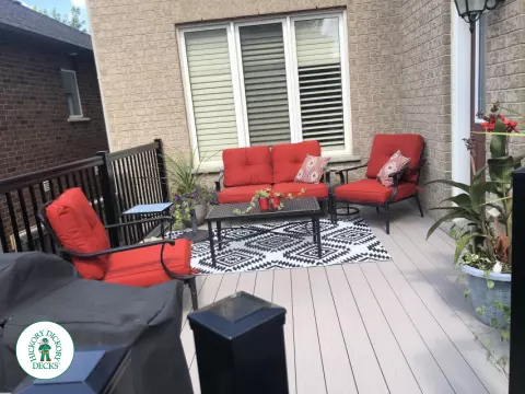 Azek deck with aluminum railing and lights in stairs in Innisfil