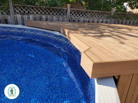 Fiberon above ground pool deck with aluminum railings in Hamilton Mountain