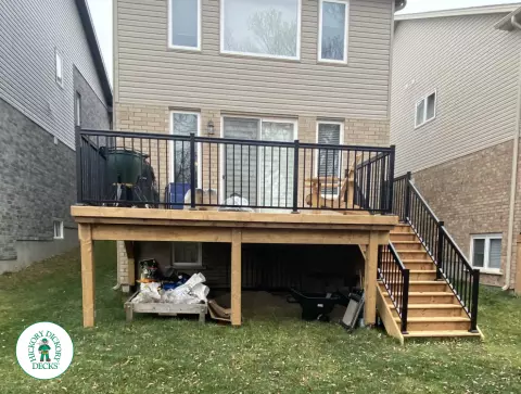 Pressure Treated Custom Deck with Aluminum Railing in London Ontario