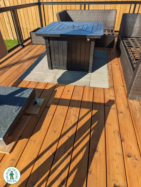 Large cedar deck with stairs, aluminum railing