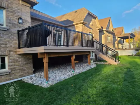 Clubhouse high deck with aluminum railing and stairs in Brampton