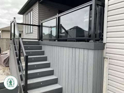 Fiberon deck with aluminum railings, stairs and lights in Niagara