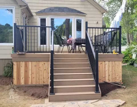 Small timbertech deck in Halifax with aluminum railing and stairs