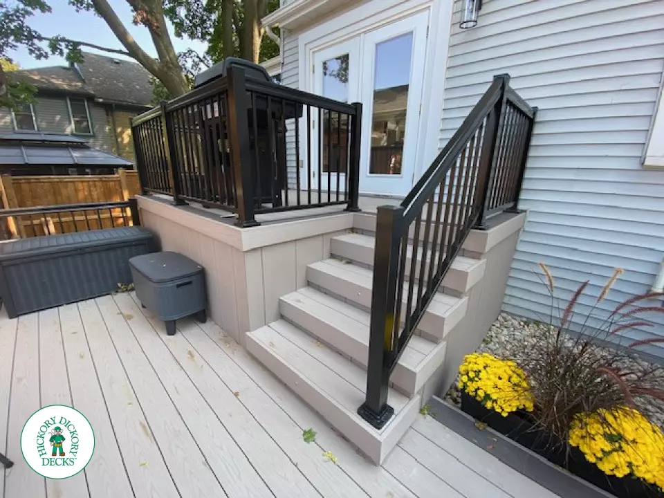 Large Azek deck with unique stairs and a cedar pavilion for shade.