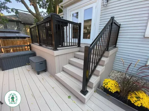 Large Azek deck with unique stairs and a cedar pavilion for shade.