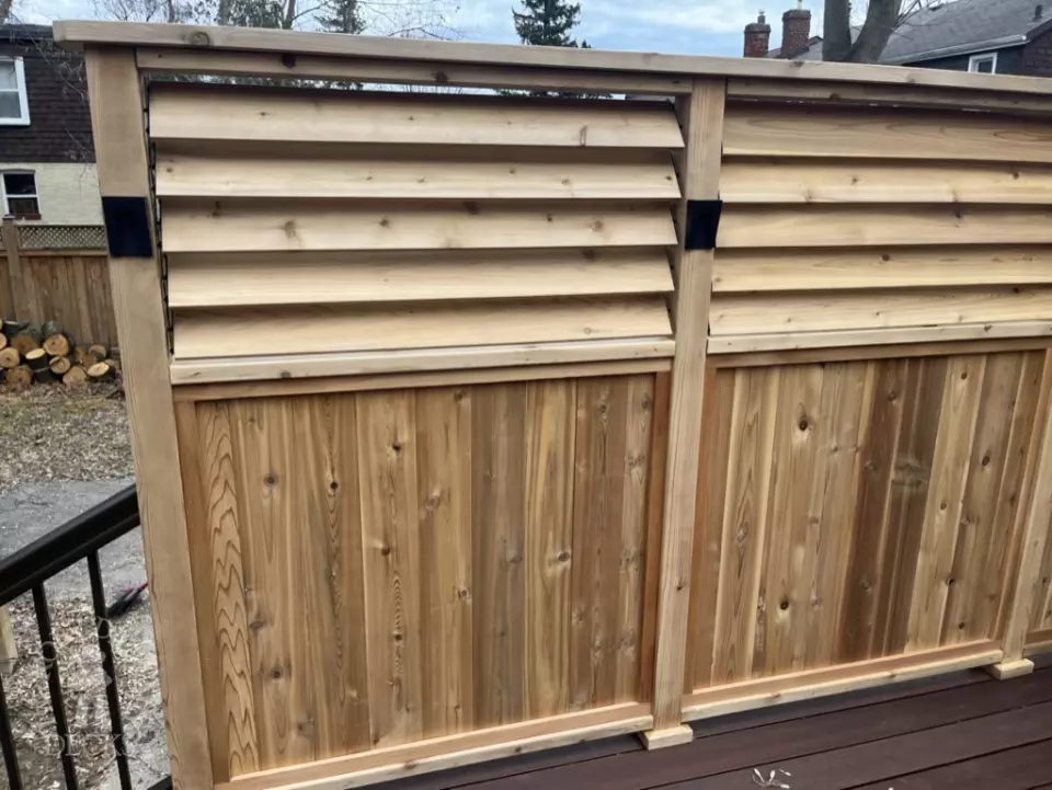 Armadillo deck with privacy screens and lights in Toronto
