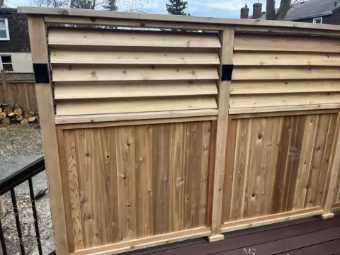 Armadillo deck with privacy screens and lights in Toronto