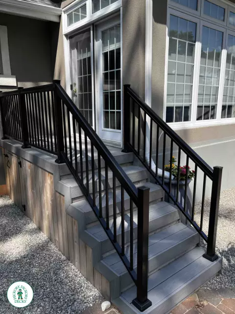 Small grey fiberon deck with black aluminum railing