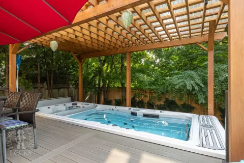 Clubhouse hot tub deck with pergola in North York