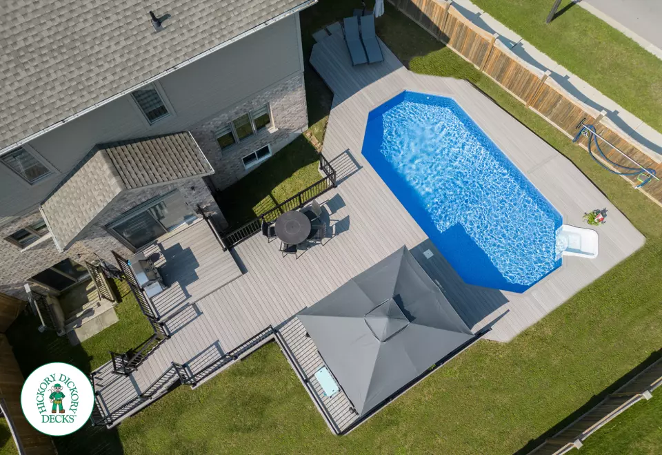 1000 square foot composite pool deck in grey shade.