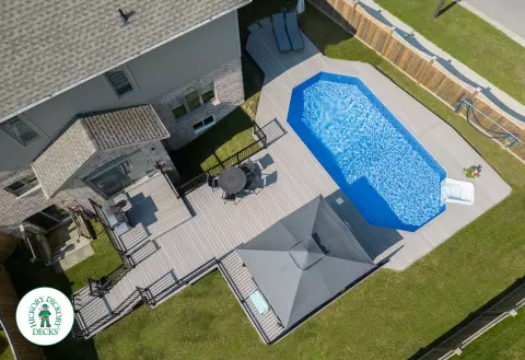 1000 square foot composite pool deck in grey shade.