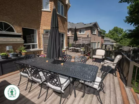 Zuri deck with floor pattern, built in ights and privacy screens in Richmond Hill