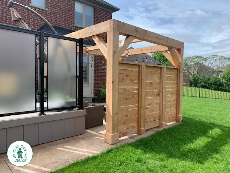 Slate grey Azek deck with large privacy screens, a pergola and aluminum rails, Kitchener, Ontario