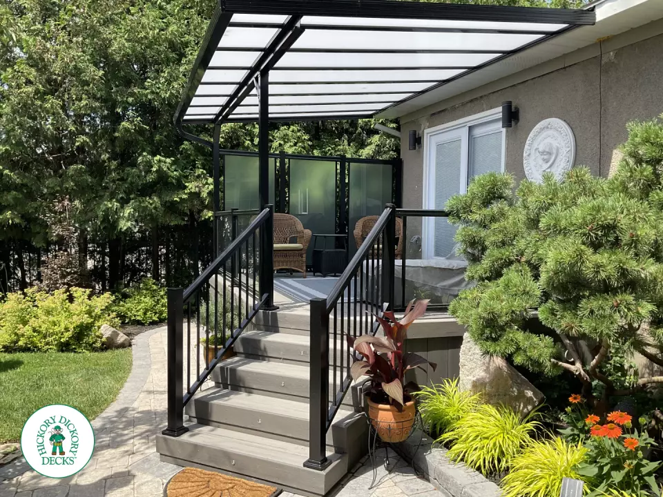 Timbertech deck with privacy screens in Niagara