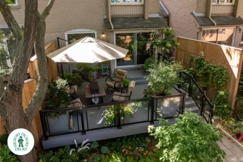 Fiberon deck with glass railing and lights in Mississauga