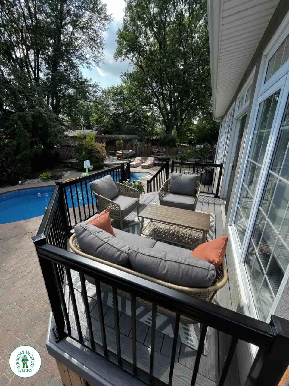 Small grey fiberon deck with black aluminum railing