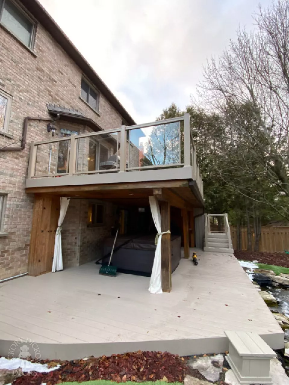 2 Level Clubhouse Deck with Glass Railing in Aurora