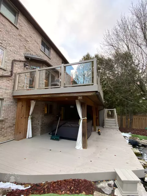 2 Level Clubhouse Deck with Glass Railing in Aurora