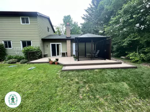 Low azek deck with roof structure