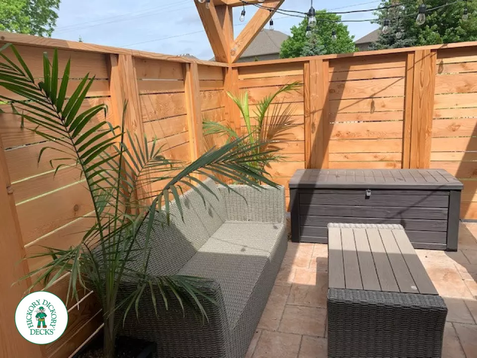 Slate grey Azek deck with large privacy screens, a pergola and aluminum rails, Kitchener, Ontario