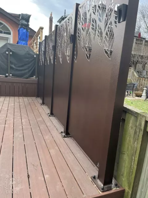 Armadillo deck with privacy screens and lights in Toronto