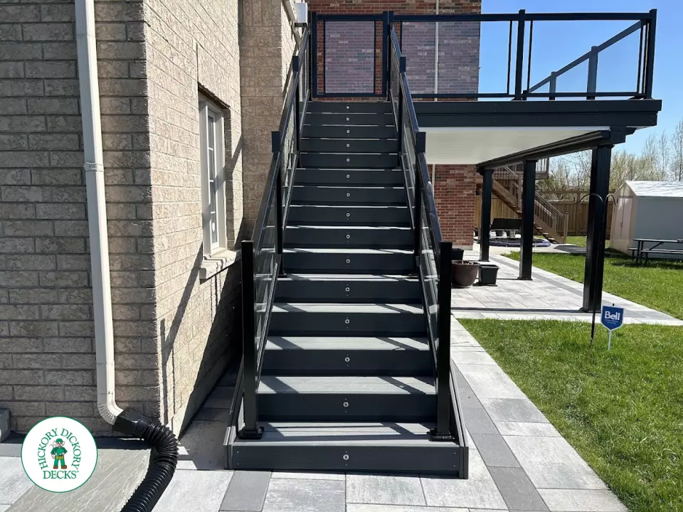 Trex high deck with glass railings in Brampton