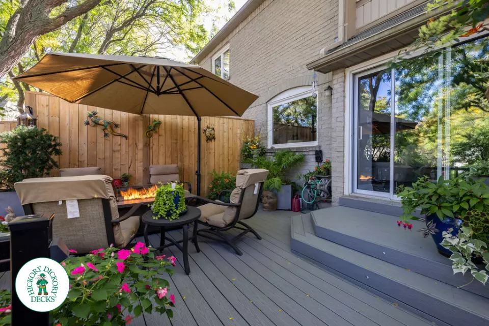 Fiberon deck with glass railing and lights in Mississauga