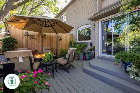 Fiberon deck with glass railing and lights in Mississauga