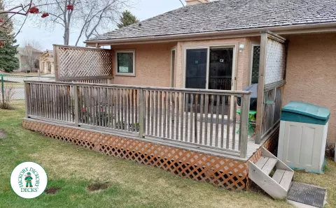 Timbertech deck in Calgary with privacy and glass rail