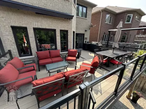 Clubhouse high deck with glass rail and spiral staircase in Newmarket