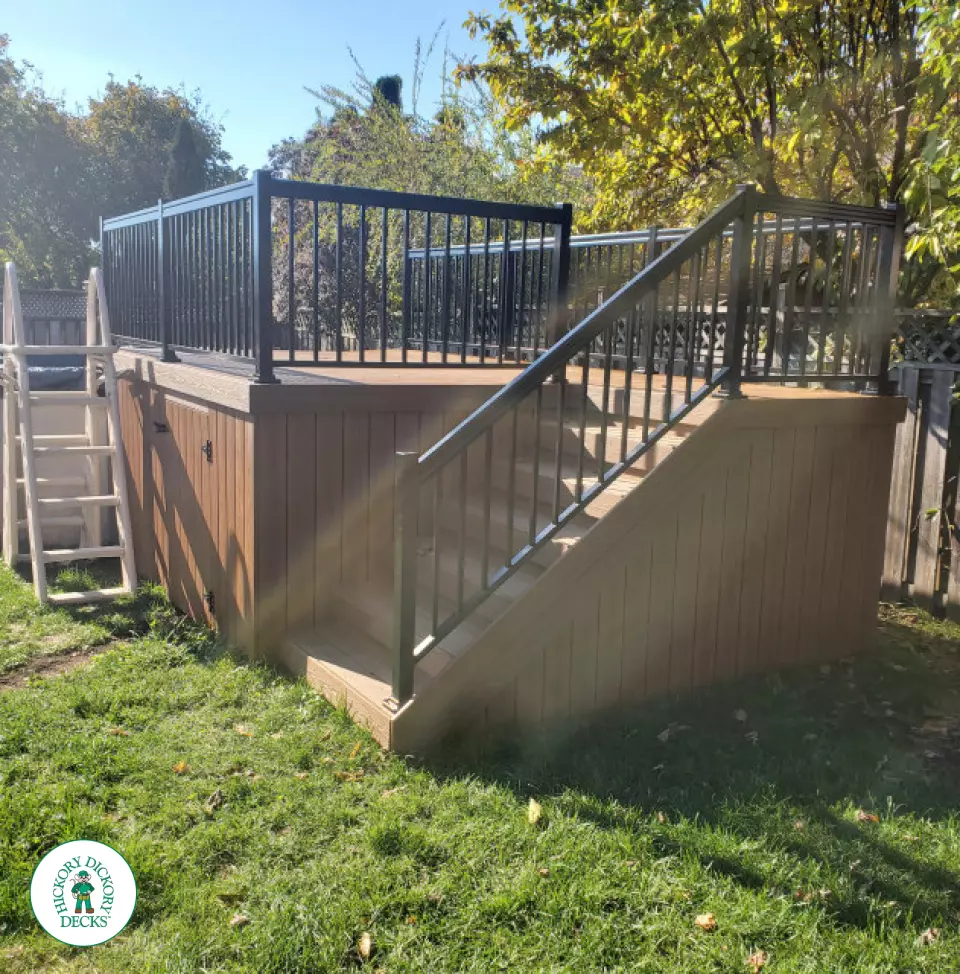Fiberon above ground pool deck with aluminum railings in Hamilton Mountain