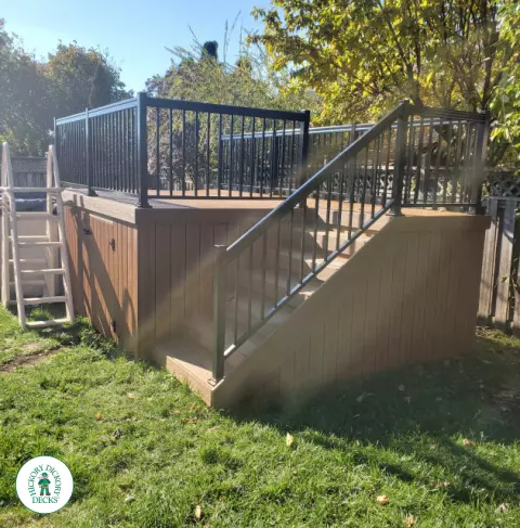 Fiberon above ground pool deck with aluminum railings in Hamilton Mountain