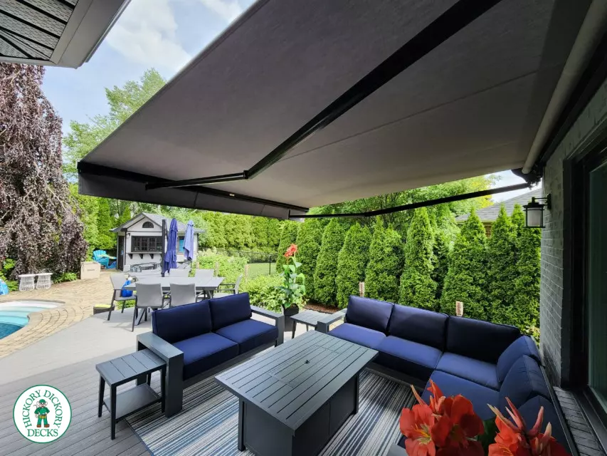 Large grey fiberon deck with a Rolltec awning