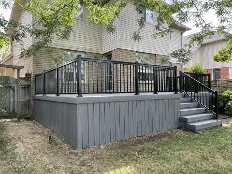 Small porch and deck built in dark grey clubhouse