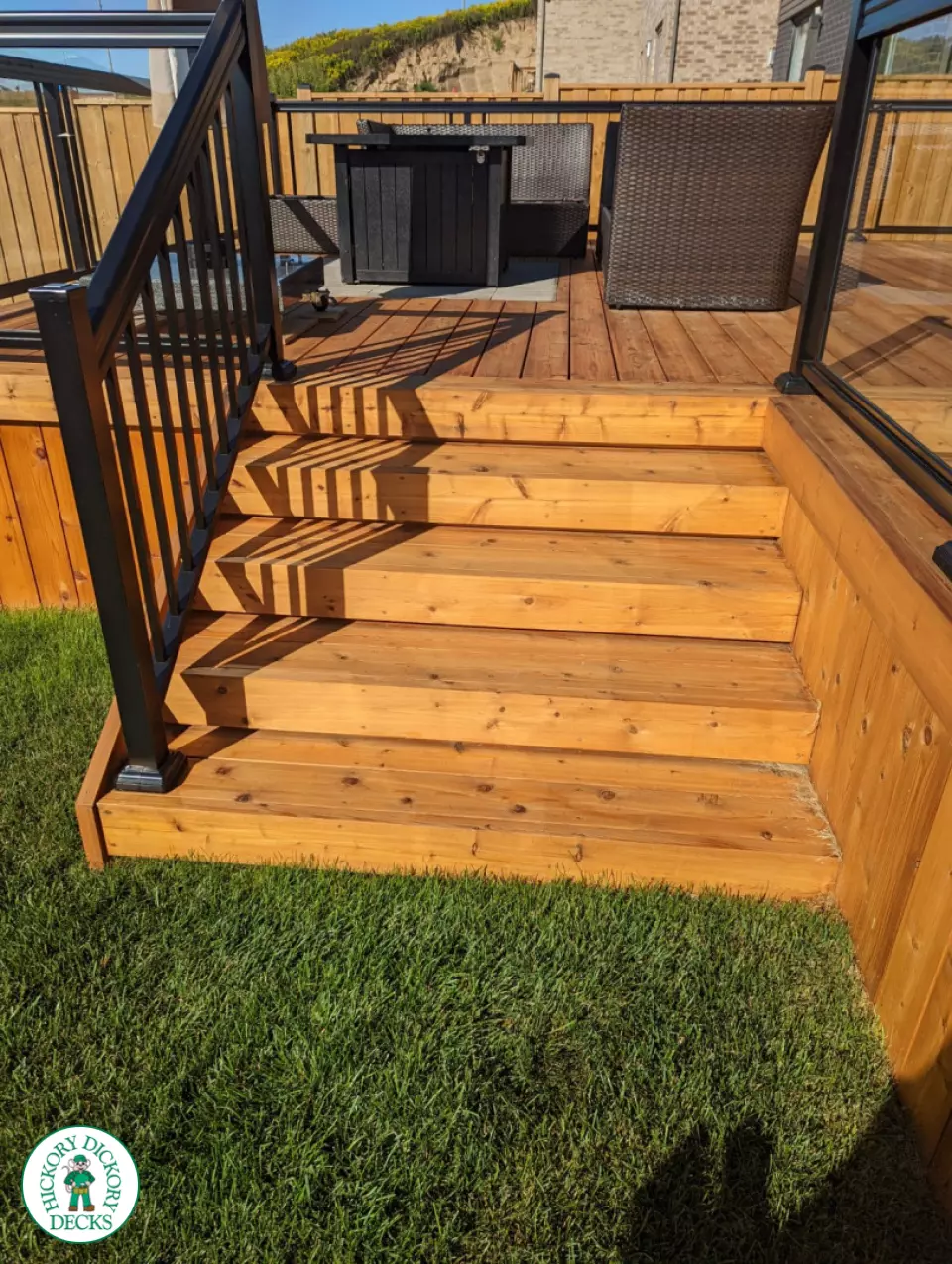 Large cedar deck with stairs, aluminum railing