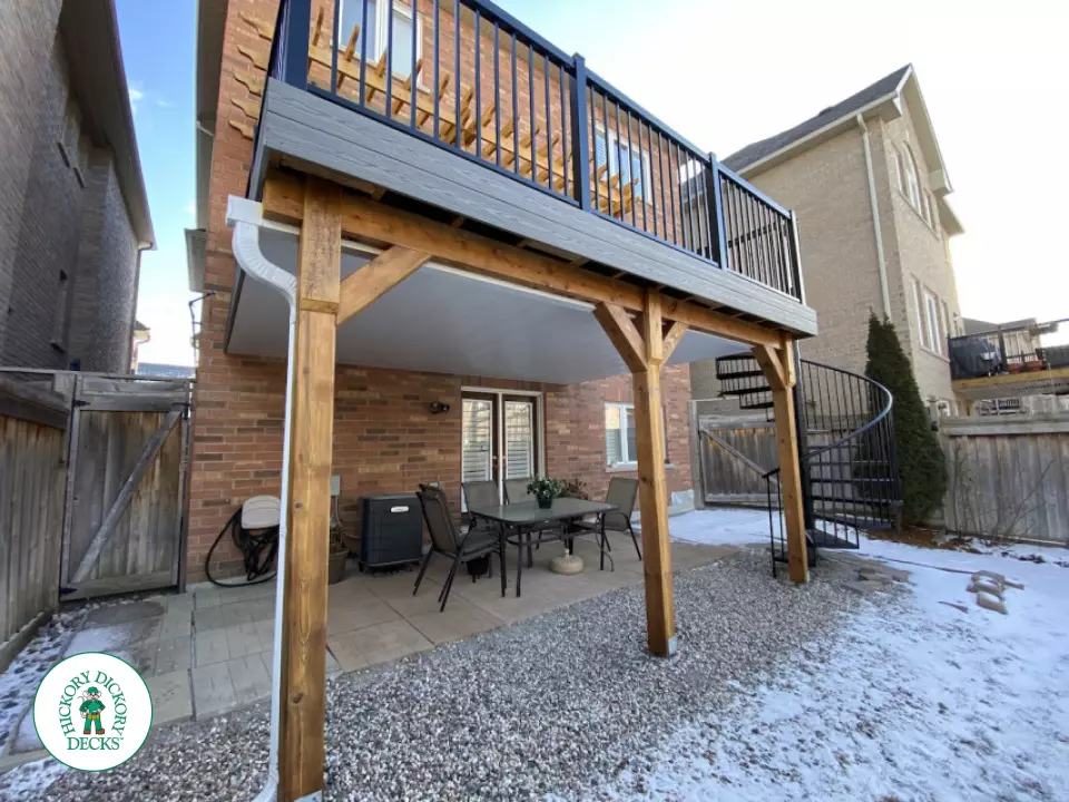 Fiberon high deck with spiral stairs and aluminum railings in Newmarket