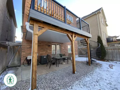 Fiberon high deck with spiral stairs and aluminum railings in Newmarket