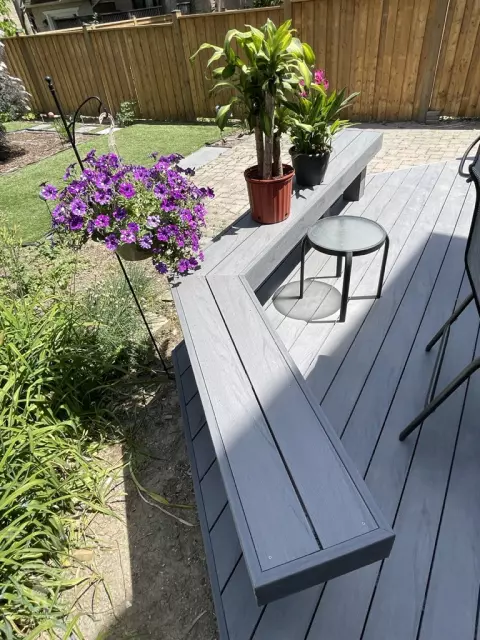 Small multilevel grey deck with lights in steps