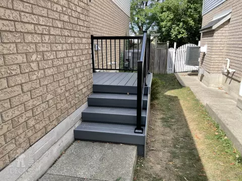 Small porch and deck built in dark grey clubhouse
