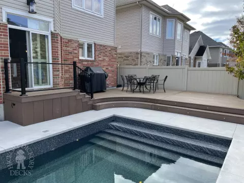 Fiberon Pool Deck with glass rail in Ottawa