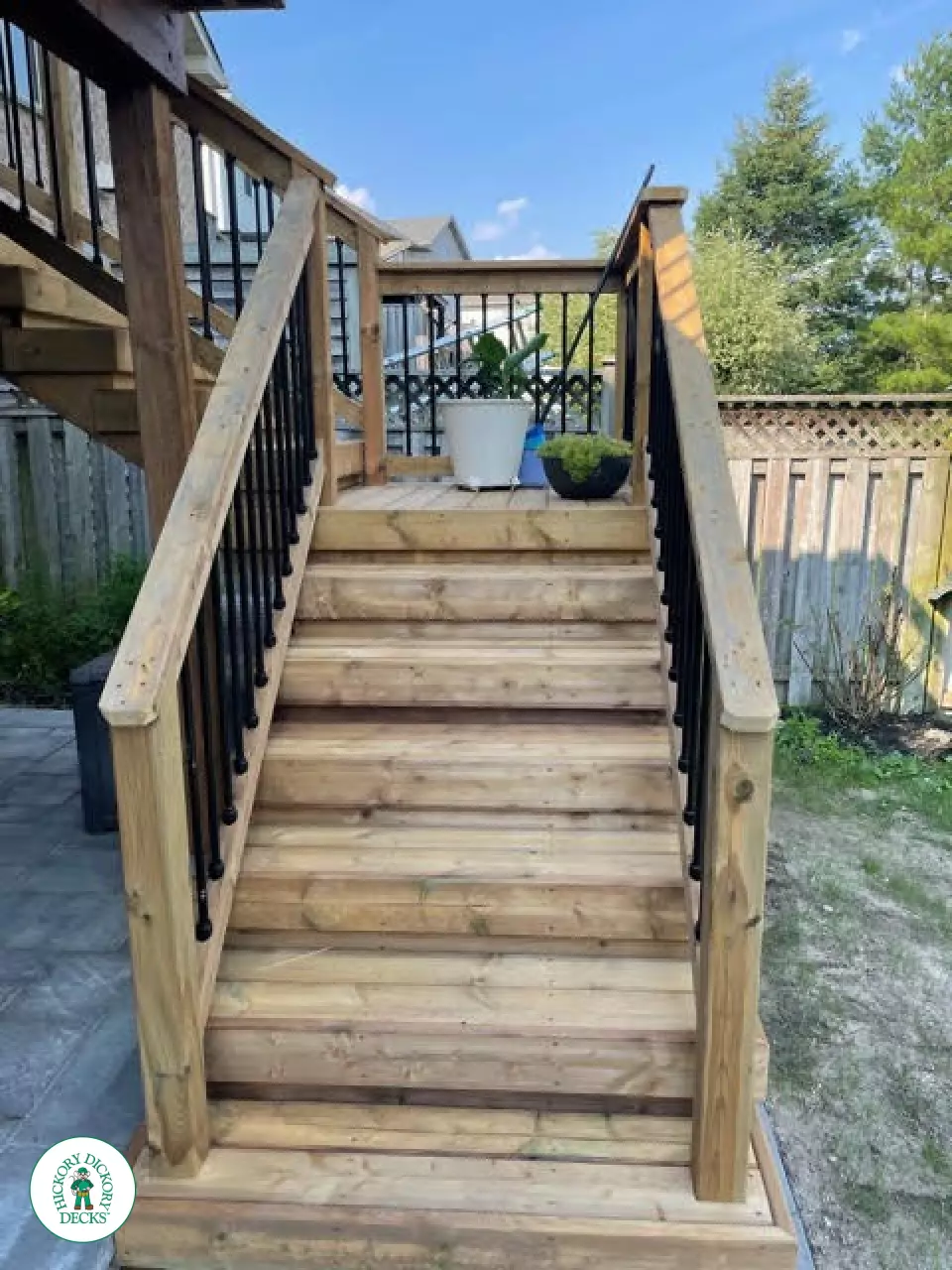 Pressure treated high deck with privacy and stairs in Kitchener