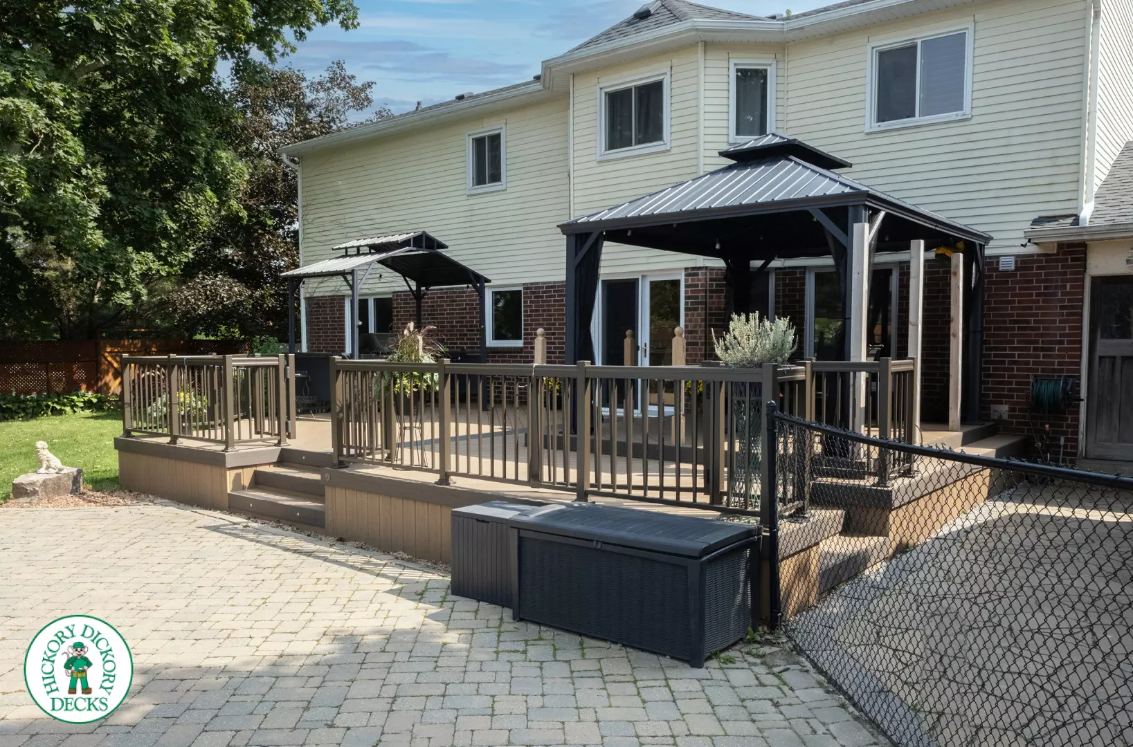 Clubhouse deck with aluminum railing with gate insert for access.