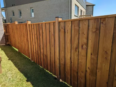 Pressure treated deck with pressure treated privacy screens and fence.