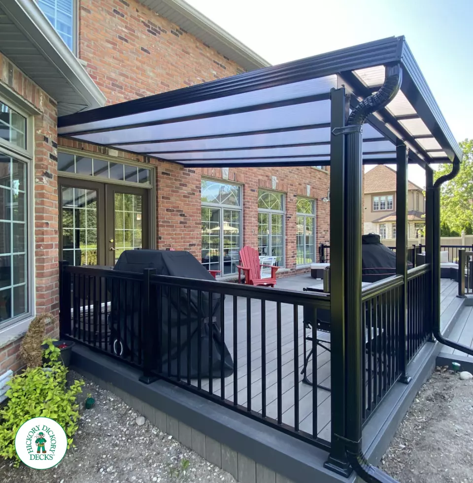 Clubhouse deck with aluminum railings, lights and custom roof in London Ontario