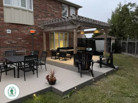 Clubhouse hot tub deck with built in lights pergola and privacy screens